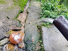 Underground water, a natural resource, seen here coming out of a pipe in Himachal Pradesh, India Natural underground water resource.jpg