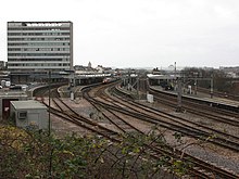 Plymouth station from the east. A CrossCountry train is standing in platform 4.