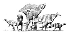 Razni ornitopodi. Daleko lijevo: Camptosaurus, lijevo: Iguanodon, centar u pozadini: Shantungosaurus, centar sprijeda: Dryosaurus, desno: Corythosaurus, daleko desno (manji): Heterodontosaurus (vjerojatno nije ornitopod), daleko desno: Tenontosaurus.
