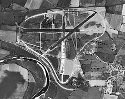 Black and white vertical aerial imagery showing the: runways. And the——River Swale in the bottom left