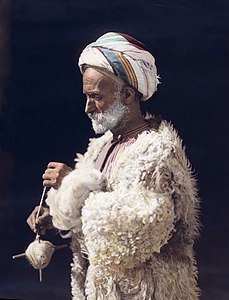 Ramallah man spinning wool, by American Colony Jerusalem (edited by Durova)