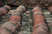 Imbrices and tegulae are still in use in Rome in 2005. RoofTiles CC-BY Stewart.jpg