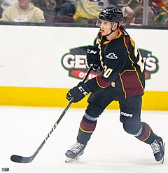 Photographie couleur d'un joueur de hockey sur glace