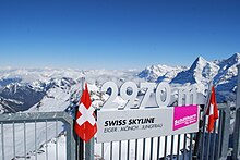 The panoramic view of the Eiger, Monch and Jungfrau mountains from the viewing platform at Piz Gloria.