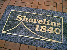 A plaque laid by the Historic Places Trust to mark Wellington's original shoreline. Shoreline plaque Wellington.jpg