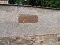 Pískovcový kámen z vnější jižní strany hřbitova.