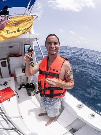 Thomas Gray, CLS America, is holding a SeaTag-MOD pop-up satellite tag which is ready for deployment on a whale shark (Isla Mujeres, MX). TGSEATAGMOD.jpg