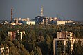 The damaged unit 4 reactor and shelter at Chernobyl, as seen from a rooftop in Pripyat (02710147).jpg