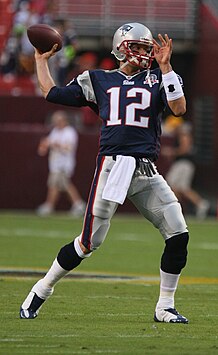 7-time Super Bowl winning quarterback Tom Brady attempting a forward pass in a 2009 game against the Washington Redskins. Tom Brady (cropped).jpg