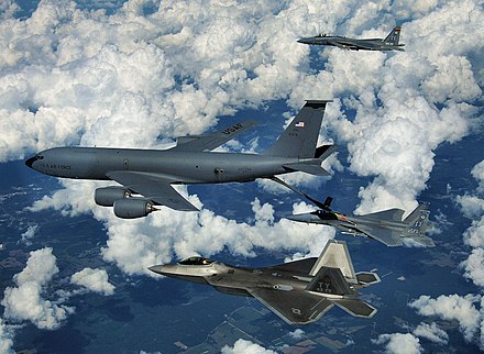 An F-22 Raptor and two F-15 Eagles from Tyndall Air Force Base participate in a refueling mission with a KC-135 Stratotanker from the Mississippi Air National Guard over eastern Florida, 22 September 2008.