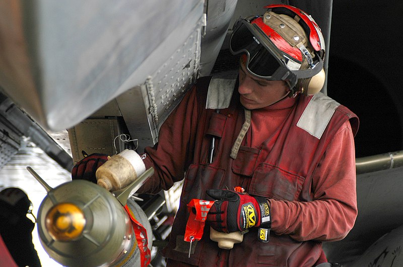 File:US Navy 030323-N-6817C-149 An Aviation Ordnanceman inspects precision guided ordnance attached to an F-14D Tomcat aboard USS Abraham Lincoln (CVN 72).jpg