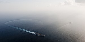 US Navy 120119-N-OY799-284 The Nimitz-class aircraft carrier USS John C. Stennis (CVN 74) breaks away from USS Abraham Lincoln (CVN 72) after a tur.jpg