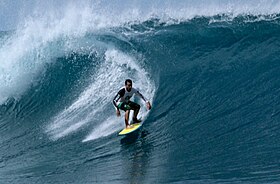 Surfing activity in Lagundri Beach