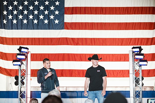 Cerrone (right) on stage with Anthony Pettis for a USO tour