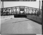 VIEW OF SUPERSTRUCTURE, SHOWING SPAN AND TENDER HOUSE, LOOKING EAST - Chapel Street Swing Bridge, Spanning Mill River on Chapel Street, New Haven, New Haven County, CT HAER CONN,5-NEWHA,51-5.tif