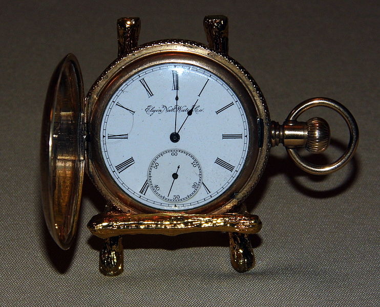 File:Vintage Elgin Goldtone Pocket Watch, Case by Essex Watch Case Co. and Guaranteed for 20 Years (8604794984).jpg