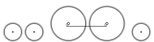 Diagram of two small leading wheels, two large driving wheels joined by a coupling rod, and one small trailing wheel