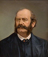 William Burges in 1881.