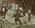 Workers setting rough stone in place-Minnesota State Capitol-1899.jpg