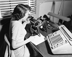 A human computer, with microscope and calculator, 1952 X-4 with Female Computer - GPN-2000-001932.jpg