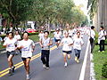 More and more runners were on the road of finish area.