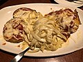 Thumbnail for File:2019-05-11 20 41 32 "Tour of Italy" (Lasagna Classico, Fettuccine Alfredo, and Eggplant Parmigiana (substituted for the usual Chicken Parmigiana)) at the Olive Garden in Fair Lakes, Fairfax County, Virginia.jpg