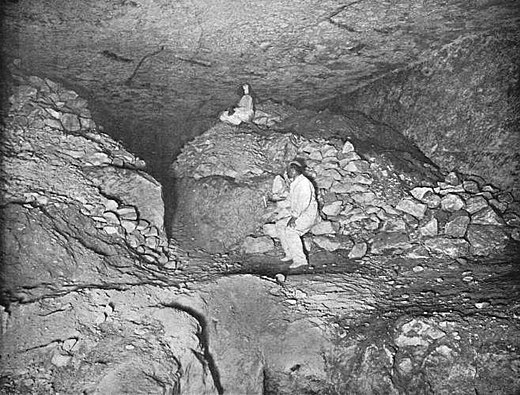 Subterranean Chamber (looking west) in 1909 with rubble from the Pit Shaft excavation still filling the chamber.