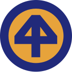 A yellow circular emblem with a blue "4" overlayed in normal and reverse, with a blue border