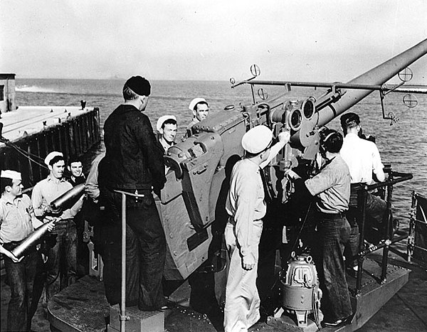 5"/38 caliber gun with crew of 12–20 men