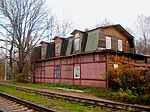 Дом при старом Озерковском вокзале Приморской железной дороги (деревянный одноэтажный, с мансардным этажом)