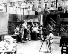 Image 7A.E. Smith filming The Bargain Fiend in the Vitagraph Studios in 1907. Arc floodlights hang overhead. (from History of film)