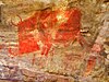 A man being hunted by a beast, Bhimbetka Cave paintings.jpg