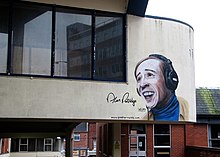 A mural of Alan Partridge on the Hollywood Cinema in Norwich, where Alpha Papa premiered in 2013 Alan Partridge at the Hollywood Cinema (geograph 6378088).jpg