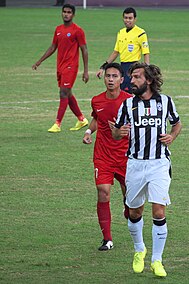 Shahril Ishak marking Juventus star, Andrea Pirlo in a pre-season friendly in August 2014. Andrea Pirlo 20140816.jpg