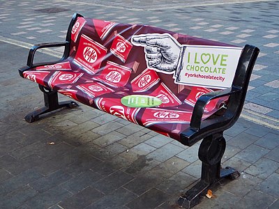 Bench with Kit Kat advertising in York (where the bar was created by the confectionery company Rowntree's) to mark National Chocolate Week in 2018