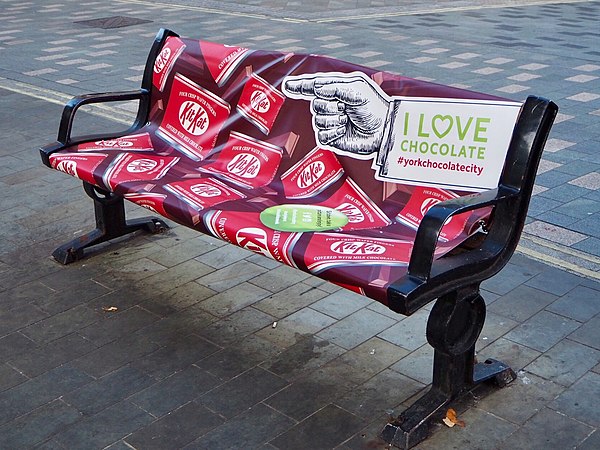 Bench with Kit Kat advertising in York (where the bar was created) to mark National Chocolate Week in 2018