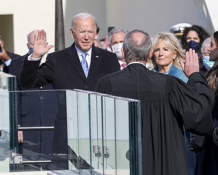Chief Justice John Roberts administers the presidential oath of office to Biden at the Capitol, January 20, 2021.