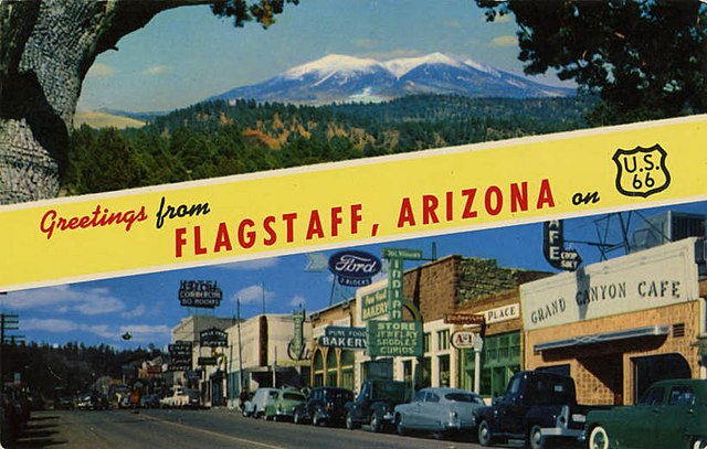 A 1946 postcard of Flagstaff with a U.S. Route 66 insignia to the right