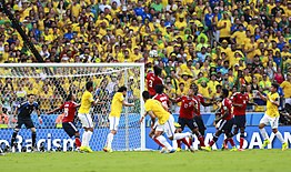 Yepes heading the ball against Brazil at the 2014 FIFA World Cup