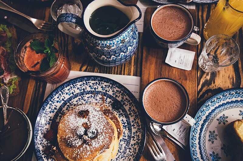 File:Breakfast table with pancakes (Unsplash).jpg