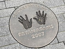 Adams' handprints at Wembley Square of Fame Bryan Adams hands.jpg