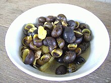 Freshwater nerites are used in Malaysian cuisine Cooked Snail Found In Rajang River.jpg