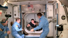 Bob Behnken enters the ISS shortly after the Crew Dragon hatch opened. Crew Dragon Demo 2 entering ISS.png