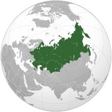 An orthographic projection of the world highlighting Belarus, Kazakhstan and Russia in green.