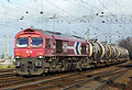 * Nomination HGK/RheinCargo DE 62 with a tank train in the near of the marshalling yard Köln-Kalk Nord --Rolf H. 04:36, 27 December 2015 (UTC) * Promotion  Support Good quality. --XRay 06:32, 27 December 2015 (UTC)