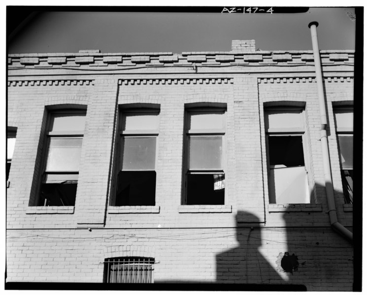 File:Detail of the south side of the building showing the decorative-brick cornice, typical double-hung window, and chimneys. Credit GADA-MRM. - Stroud Building, 31-33 North Central HABS ARIZ,7-PHEN,16-4.tif