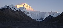 Everest's North Face, lit up by the setting sun Everest Sunset memes 2008.JPG