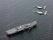 FA-18 Super Hornets fly over HMS Queen Elizabeth (R08) on 5 August 2017 (170805-N-NO901-279)