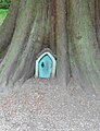 Fairy door at the foot of a tree. Do not use the tag for this case!