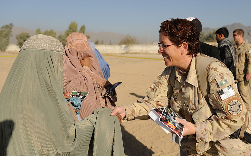 File:Female soldier tries to reach out to Afghan women during Eid.jpg